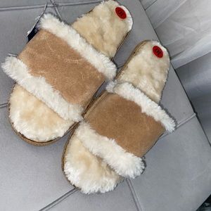 NWT size 10 Minnetonka fur slides/slippers
